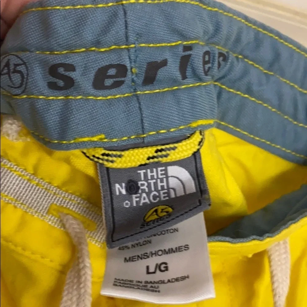 The north face men’s yellow swimming trunks